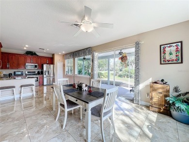 This light-filled home boasts beautiful views from the side of on Tuscawilla Country Club in Florida - for sale on GolfHomes.com, golf home, golf lot