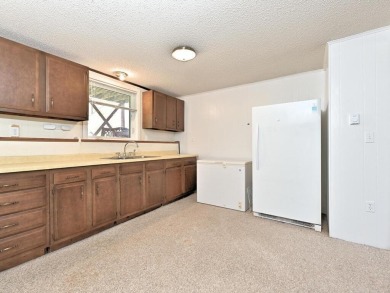 This property is ideally situated directly across from Pokegama on Pokegama Golf Course in Minnesota - for sale on GolfHomes.com, golf home, golf lot