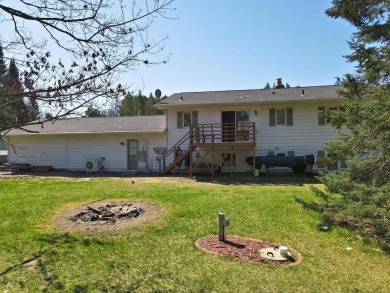 This property is ideally situated directly across from Pokegama on Pokegama Golf Course in Minnesota - for sale on GolfHomes.com, golf home, golf lot
