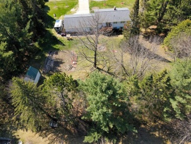 This property is ideally situated directly across from Pokegama on Pokegama Golf Course in Minnesota - for sale on GolfHomes.com, golf home, golf lot