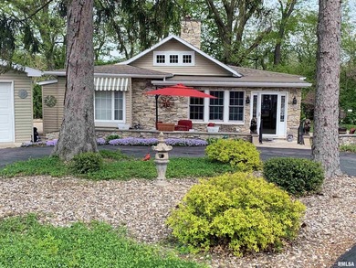 Charming and unique cottage-style home in a sought-after golf on Spring Lake Country Club in Illinois - for sale on GolfHomes.com, golf home, golf lot