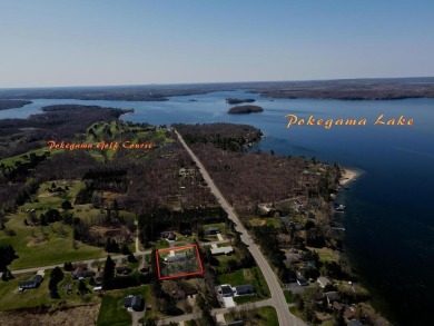 This property is ideally situated directly across from Pokegama on Pokegama Golf Course in Minnesota - for sale on GolfHomes.com, golf home, golf lot