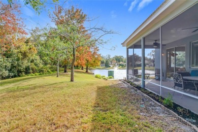 This light-filled home boasts beautiful views from the side of on Tuscawilla Country Club in Florida - for sale on GolfHomes.com, golf home, golf lot