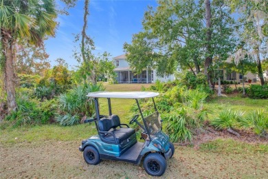 This light-filled home boasts beautiful views from the side of on Tuscawilla Country Club in Florida - for sale on GolfHomes.com, golf home, golf lot