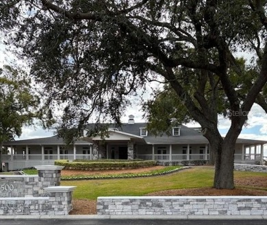 This light-filled home boasts beautiful views from the side of on Tuscawilla Country Club in Florida - for sale on GolfHomes.com, golf home, golf lot