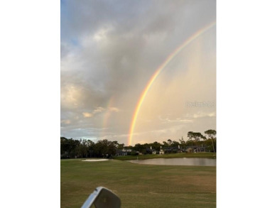 This light-filled home boasts beautiful views from the side of on Tuscawilla Country Club in Florida - for sale on GolfHomes.com, golf home, golf lot