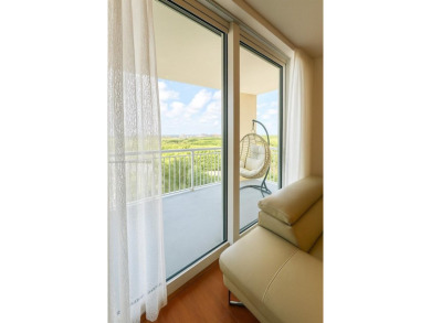 Beautifully upgraded 1-bedroom 1.5-bath condo at DUO Condominium on The Diplomat Golf Resort and Spa in Florida - for sale on GolfHomes.com, golf home, golf lot