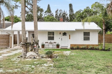 This adorable 2 bed/1 bath home is picture perfect! Fully on Hidden Lakes Golf Club in Florida - for sale on GolfHomes.com, golf home, golf lot
