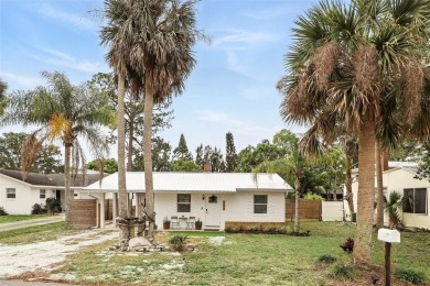 This adorable 2 bed/1 bath home is picture perfect! Fully on Hidden Lakes Golf Club in Florida - for sale on GolfHomes.com, golf home, golf lot