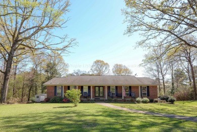 The 4 bedroom, 3 bath ranch style home you're interested in is a on Choctaw Country Club in Alabama - for sale on GolfHomes.com, golf home, golf lot