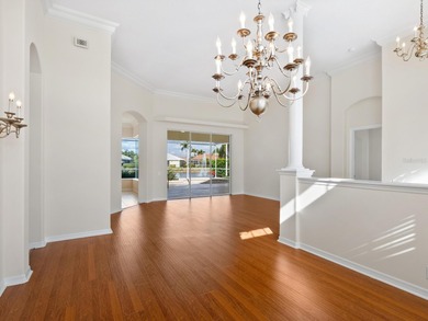 Enjoy sparkling lake and fountain views from this charming Lido on Pelican Pointe Golf and Country Club in Florida - for sale on GolfHomes.com, golf home, golf lot