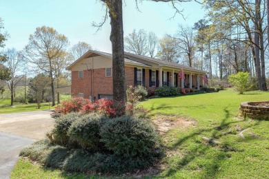 The 4 bedroom, 3 bath ranch style home you're interested in is a on Choctaw Country Club in Alabama - for sale on GolfHomes.com, golf home, golf lot