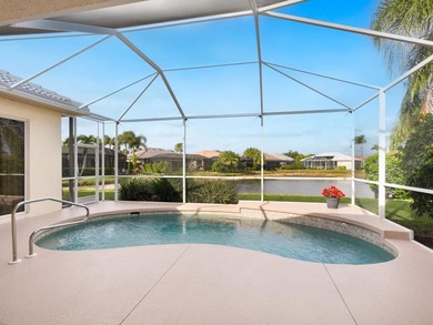 Enjoy sparkling lake and fountain views from this charming Lido on Pelican Pointe Golf and Country Club in Florida - for sale on GolfHomes.com, golf home, golf lot