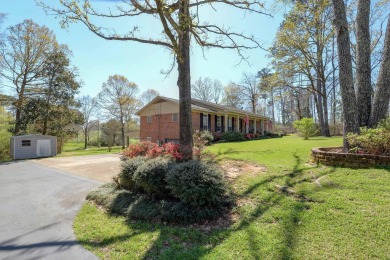 The 4 bedroom, 3 bath ranch style home you're interested in is a on Choctaw Country Club in Alabama - for sale on GolfHomes.com, golf home, golf lot