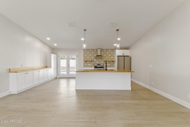 THE ONLY FULLY UPDATED HOME PRICED AT $650K WITH A POOL AND on Kierland Golf Club in Arizona - for sale on GolfHomes.com, golf home, golf lot