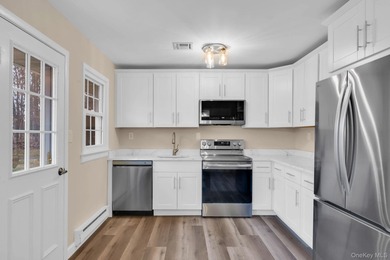 Welcome to this beautifully renovated and move-in ready Carlton on Leisure Village Golf Course in New York - for sale on GolfHomes.com, golf home, golf lot