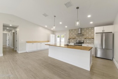 THE ONLY FULLY UPDATED HOME PRICED AT $650K WITH A POOL AND on Kierland Golf Club in Arizona - for sale on GolfHomes.com, golf home, golf lot