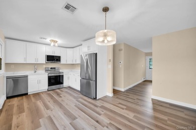 Welcome to this beautifully renovated and move-in ready Carlton on Leisure Village Golf Course in New York - for sale on GolfHomes.com, golf home, golf lot