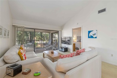 Discover the charm of this lovingly maintained end-unit condo in on The Meadows Golf and Country Club in Florida - for sale on GolfHomes.com, golf home, golf lot