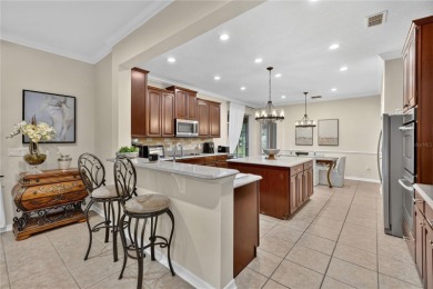 This 6-bedroom, 3.5-bath pool home in the gated North Shore at on North Shore Golf Club in Florida - for sale on GolfHomes.com, golf home, golf lot