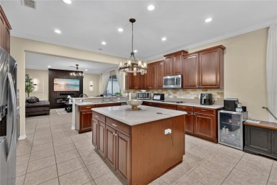 This 6-bedroom, 3.5-bath pool home in the gated North Shore at on North Shore Golf Club in Florida - for sale on GolfHomes.com, golf home, golf lot