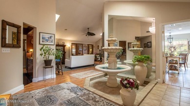 Located in the heart of Diamondhead, this spacious home sits on on Diamondhead Country Club in Mississippi - for sale on GolfHomes.com, golf home, golf lot