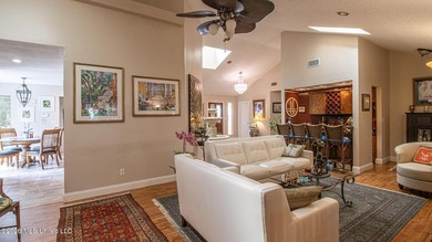 Located in the heart of Diamondhead, this spacious home sits on on Diamondhead Country Club in Mississippi - for sale on GolfHomes.com, golf home, golf lot