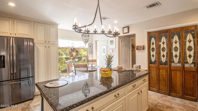 Located in the heart of Diamondhead, this spacious home sits on on Diamondhead Country Club in Mississippi - for sale on GolfHomes.com, golf home, golf lot