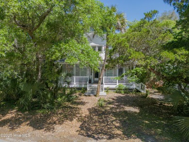 Discover the perfect island retreat in this charming coastal on Bald Head Island Golf Club in North Carolina - for sale on GolfHomes.com, golf home, golf lot
