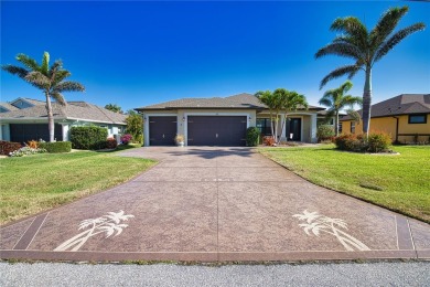 Welcome to 35 Medalist Road - the perfect blend of luxury on Rotonda Golf and Country Club - Long Marsh  in Florida - for sale on GolfHomes.com, golf home, golf lot