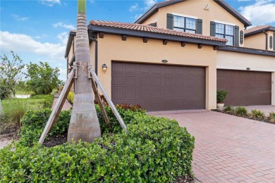 Welcome to your oasis in the heart of the esteemed Sarasota on Sarasota National Golf Club in Florida - for sale on GolfHomes.com, golf home, golf lot