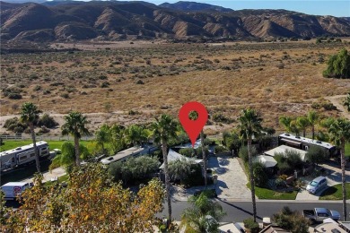 Massive Lot with all Slate Tile, Double Sided Fireplace and TV on Rancho California RV Resort in California - for sale on GolfHomes.com, golf home, golf lot