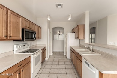 Welcome to this beautifully maintained single-level home with a on Lone Tree Golf Club in Arizona - for sale on GolfHomes.com, golf home, golf lot