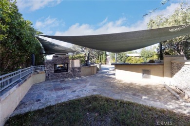 Massive Lot with all Slate Tile, Double Sided Fireplace and TV on Rancho California RV Resort in California - for sale on GolfHomes.com, golf home, golf lot