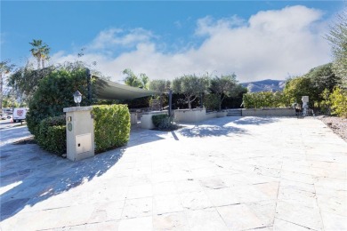 Massive Lot with all Slate Tile, Double Sided Fireplace and TV on Rancho California RV Resort in California - for sale on GolfHomes.com, golf home, golf lot