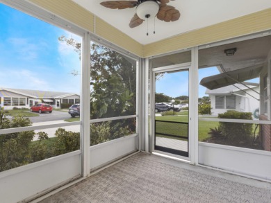 Charming 2/2 villa in the gated 55+ community of Cypress Lakes! on Cypress Lakes Golf Course - West Palm Beach in Florida - for sale on GolfHomes.com, golf home, golf lot