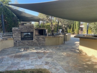 Massive Lot with all Slate Tile, Double Sided Fireplace and TV on Rancho California RV Resort in California - for sale on GolfHomes.com, golf home, golf lot
