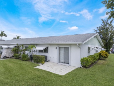 Charming 2/2 villa in the gated 55+ community of Cypress Lakes! on Cypress Lakes Golf Course - West Palm Beach in Florida - for sale on GolfHomes.com, golf home, golf lot