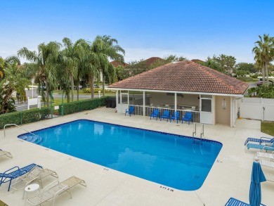 WATER VIEWS EVERYWHERE! Charming 2BR-2BA corner-unit condo in on The American Golf Club in Florida - for sale on GolfHomes.com, golf home, golf lot