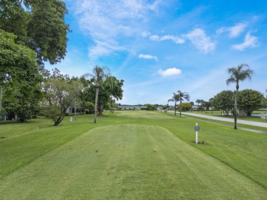 Charming 2/2 villa in the gated 55+ community of Cypress Lakes! on Cypress Lakes Golf Course - West Palm Beach in Florida - for sale on GolfHomes.com, golf home, golf lot