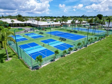 Charming 2/2 villa in the gated 55+ community of Cypress Lakes! on Cypress Lakes Golf Course - West Palm Beach in Florida - for sale on GolfHomes.com, golf home, golf lot