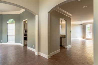 This charming 4-bedroom, 2.5-bath home overlooking the 15th tee on Thorntree Country Club in Texas - for sale on GolfHomes.com, golf home, golf lot