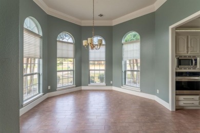 This charming 4-bedroom, 2.5-bath home overlooking the 15th tee on Thorntree Country Club in Texas - for sale on GolfHomes.com, golf home, golf lot