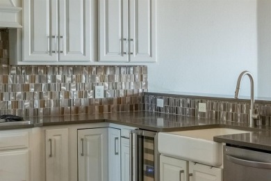 This charming 4-bedroom, 2.5-bath home overlooking the 15th tee on Thorntree Country Club in Texas - for sale on GolfHomes.com, golf home, golf lot