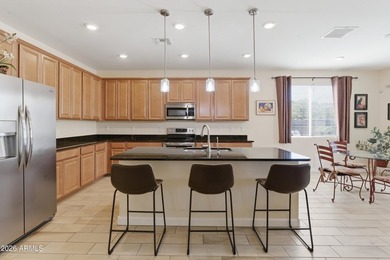 Come see this beautifully maintained home with lots of character on Verrado Golf Club - Victory in Arizona - for sale on GolfHomes.com, golf home, golf lot