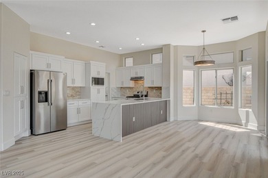 Professionally designed Sun City Summerlin view home located ON on Highland Falls Golf Club in Nevada - for sale on GolfHomes.com, golf home, golf lot