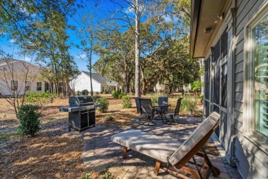 Welcome to this exceptional 3-bedroom, 3-bathroom villa in the on Pawleys Plantation Golf and Country Club in South Carolina - for sale on GolfHomes.com, golf home, golf lot