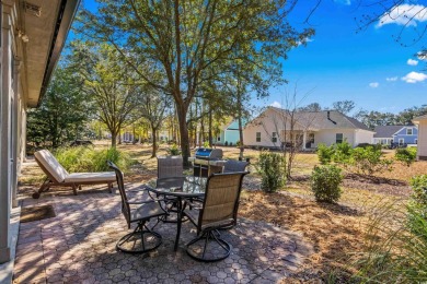 Welcome to this exceptional 3-bedroom, 3-bathroom villa in the on Pawleys Plantation Golf and Country Club in South Carolina - for sale on GolfHomes.com, golf home, golf lot