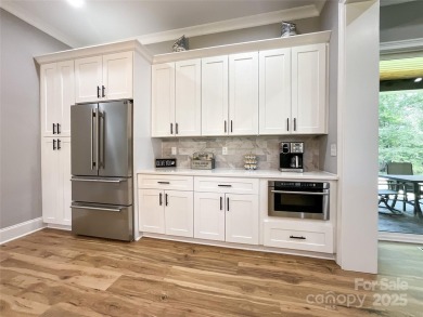 Discover this stunning custom-built farmhouse nestled on 3.27 on Eagle Chase Golf Club in North Carolina - for sale on GolfHomes.com, golf home, golf lot