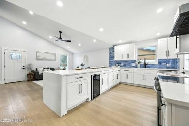 This fully renovated 4-bedroom, 2-bath home blends modern on Jacksonville Beach Golf Course in Florida - for sale on GolfHomes.com, golf home, golf lot